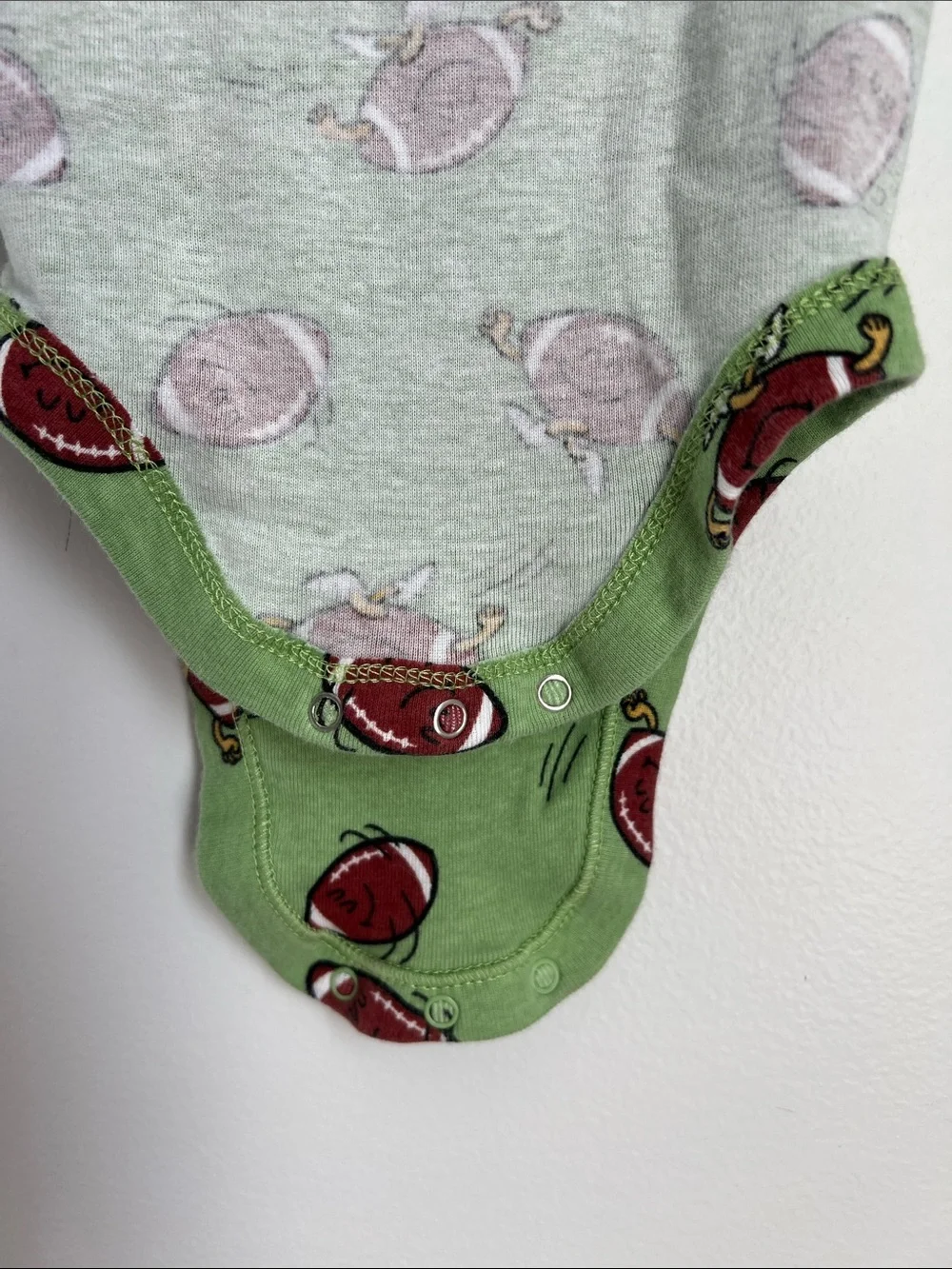 Old Navy | Green Football-Print Long-Sleeve Baby One-Piece 6-12 Months